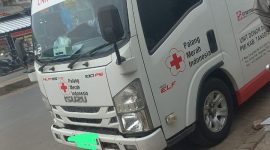 Foto saat kendaraan mini bus PMI Curug parkir diarea trotoar 